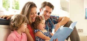 A family reading a book together